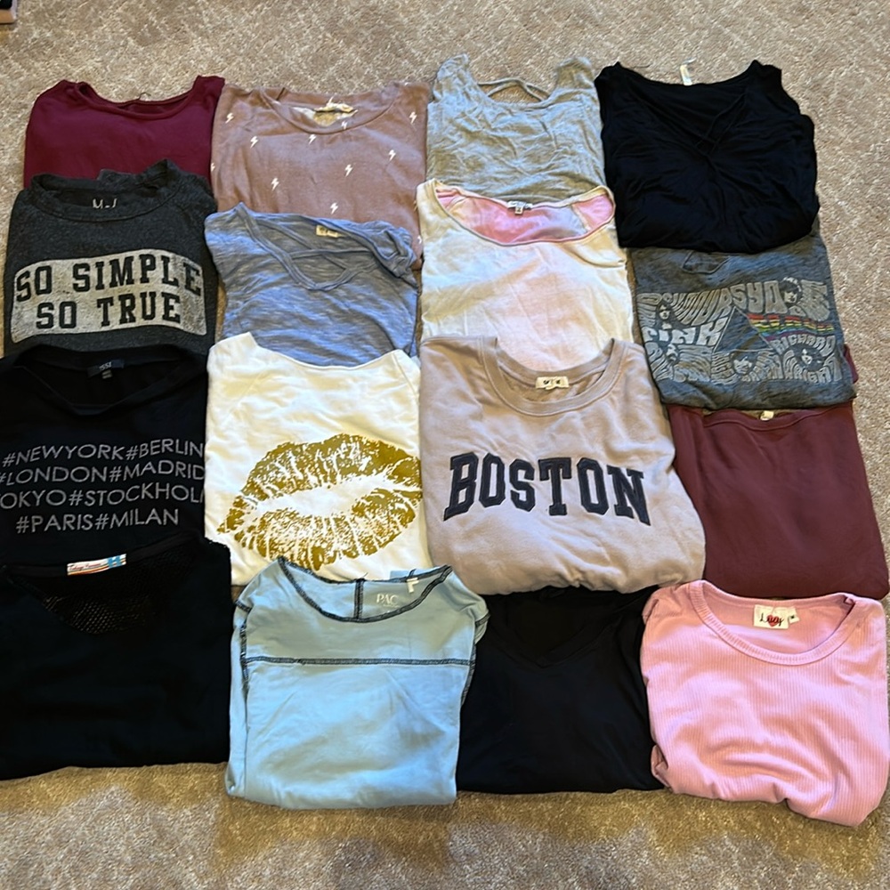 16 girls variety of tops  different brands and styles  fitting a size 14 girl.